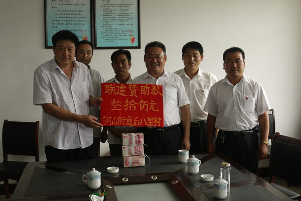 与大束镇灰埠村结对帮扶